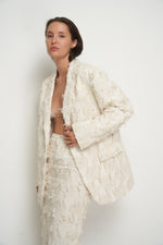 Load image into Gallery viewer, Beige jacket with torn fabric