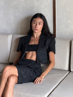 Load image into Gallery viewer, Black print midi skirt