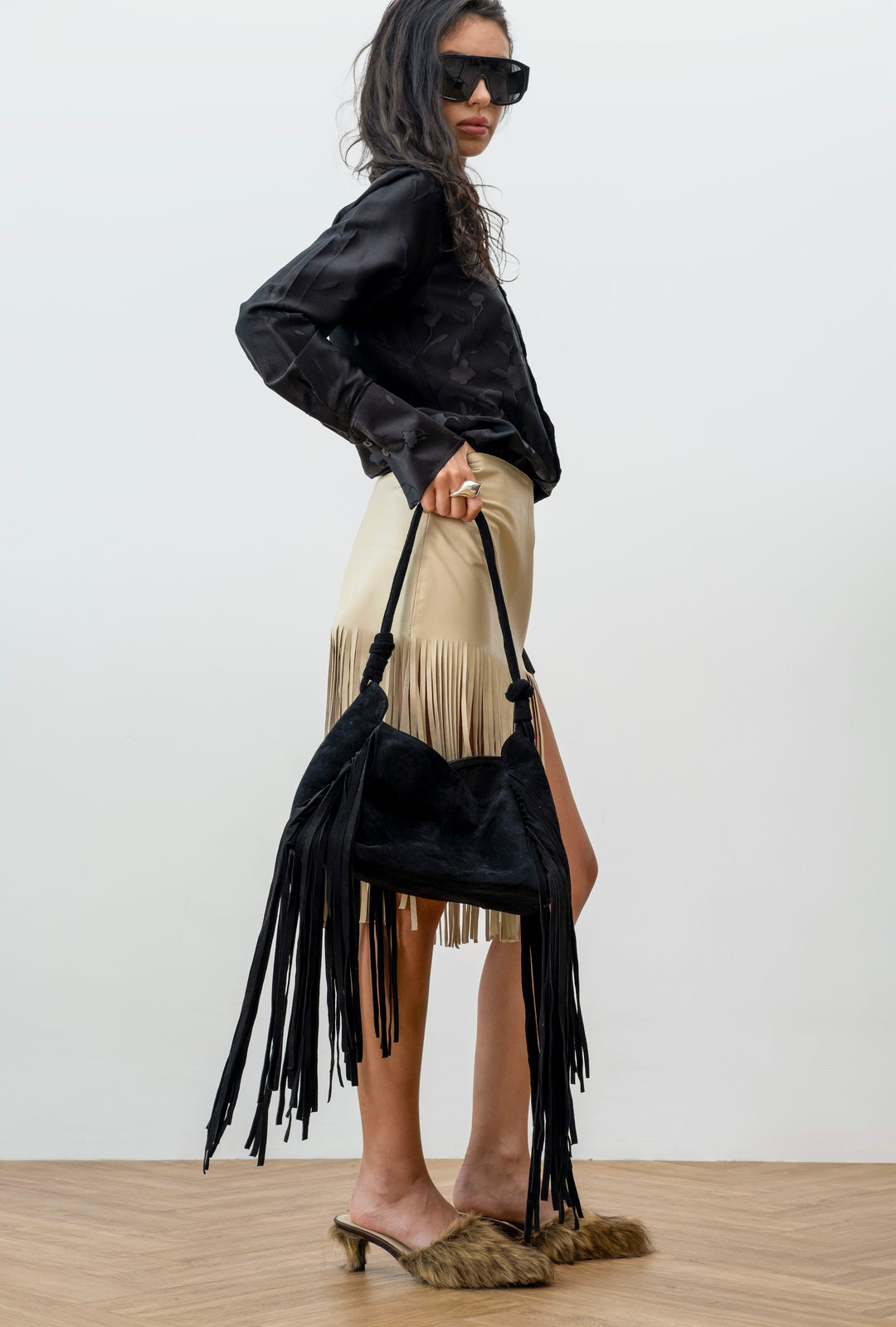 Black suede bag with fringe