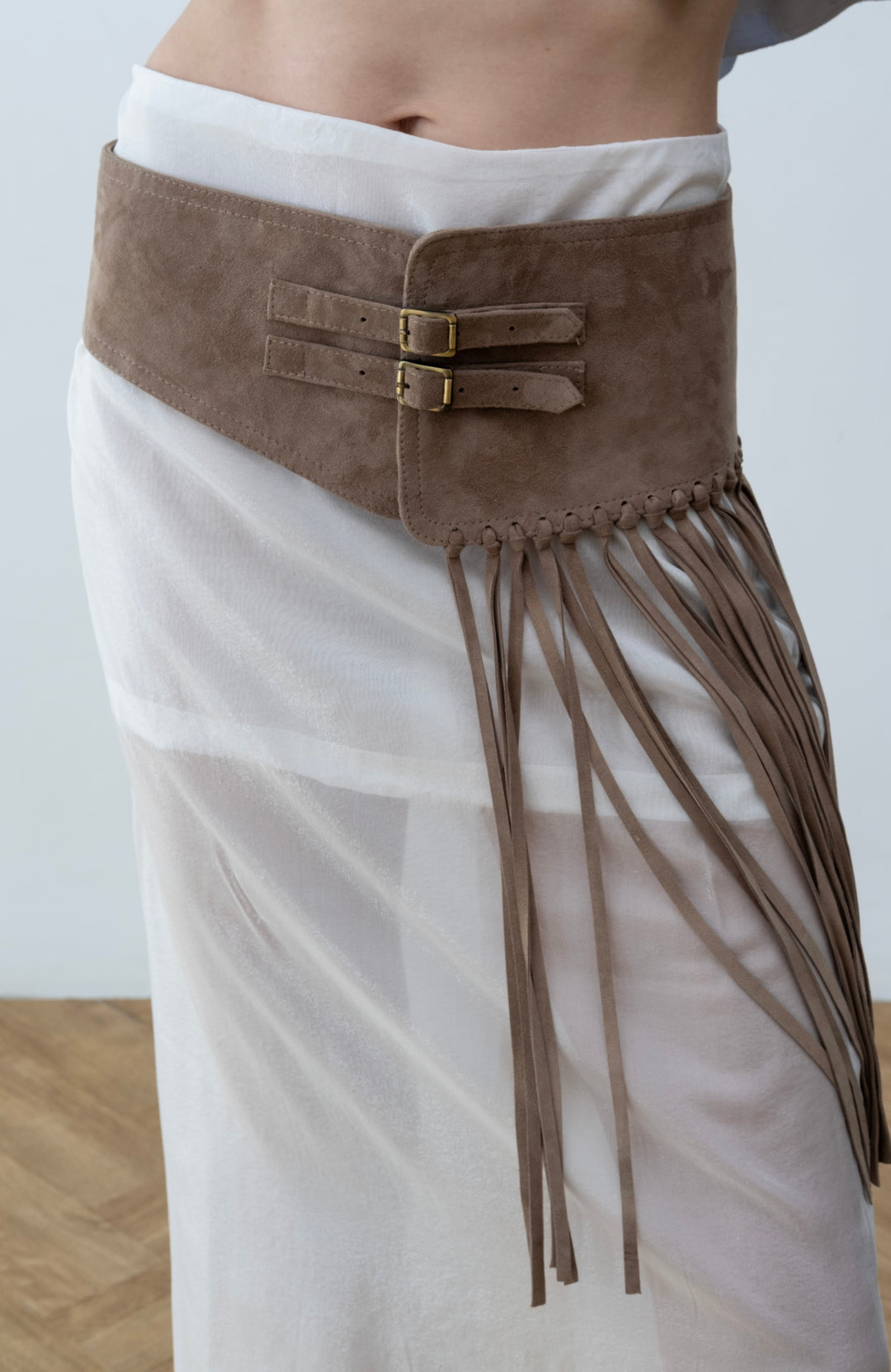 Beige suede belt with fringe