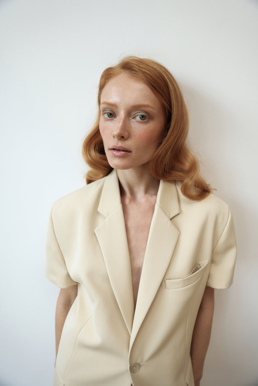 Beige jacket with short sleeves