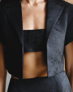 Load image into Gallery viewer, Short black print jacket with a scarf
