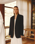 Load image into Gallery viewer, Black jacket with a heart on the back
