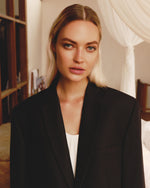 Load image into Gallery viewer, Black jacket with a heart on the back
