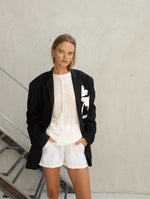 Load image into Gallery viewer, Black jacket with white flower

