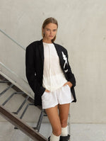 Load image into Gallery viewer, Black jacket with white flower
